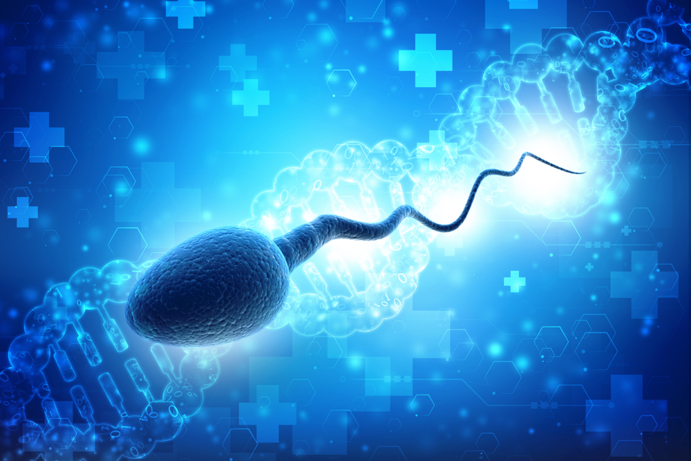Doctor explaining DNA Fragmentation Index (DFI) test for male infertility at Karnic Clinic.